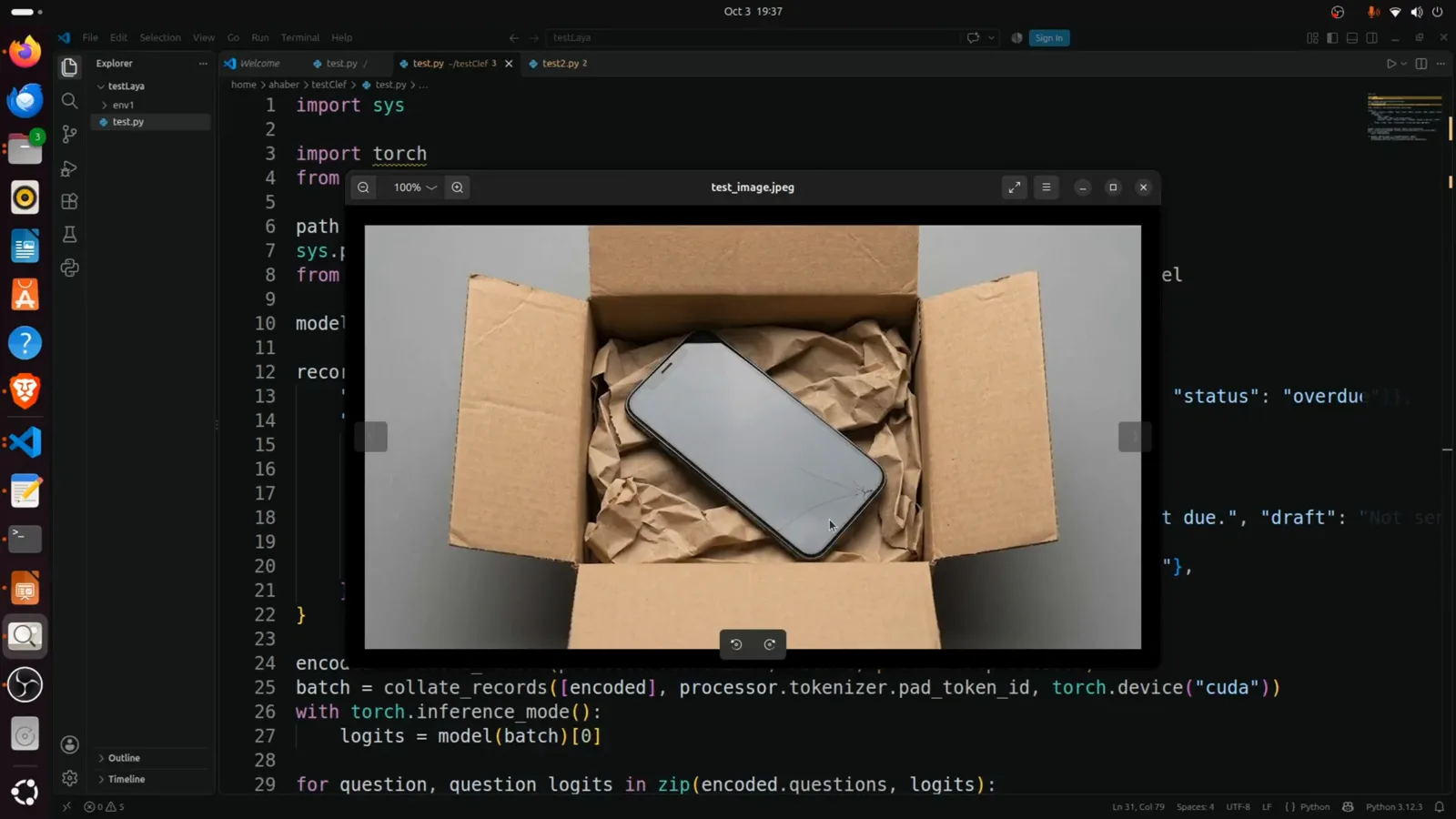 test_image.jpeg open in an Ubuntu image viewer showing a smartphone with a cracked screen packed in a cardboard box with crumpled paper for the Clef-Flash multimodal demo